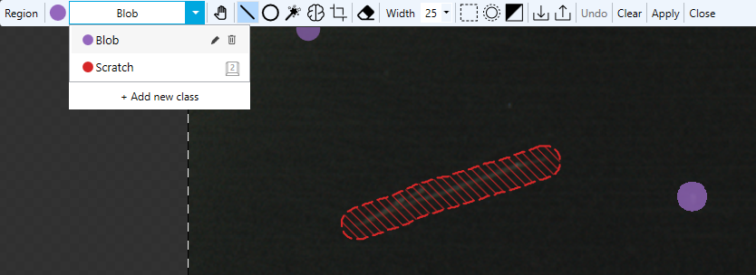Multiple labeled defects with the Edit Regions toolbar open.